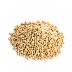 Heap of dried buckwheat seeds isolated on white background.