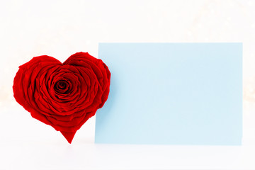 Red rose heart shaped. Valentine or Wedding background.