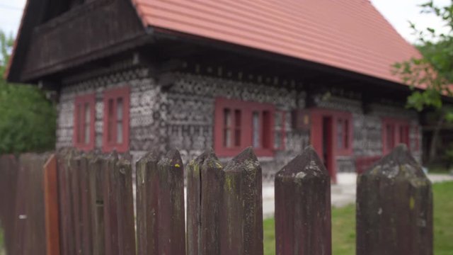 Cicmany village decorated with intricate traditional folk art patterns in white lime paint, Slovakia, Europe
