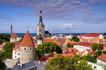 Naklejka na ściany i meble Aerial View of Tallinn Old Town, Estonia. The classic Iconic view of the city. Tallinn city wall and St. Olaf's Church view.
