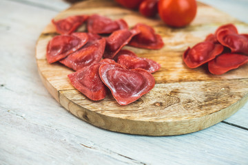 red, heart-shaped tomato ravioli