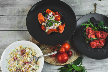 red, tomato-shaped heart-shaped ravioli, with the addition of an Italian salad