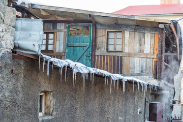 Icicles on roof of old erzurum houses in Erzurum, Turkey