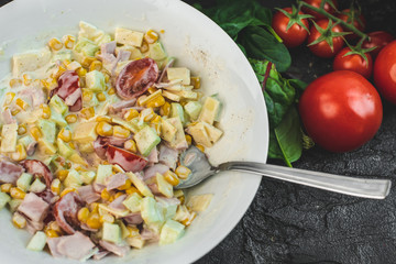 Italian, healthy salad with the addition of red tomato ravioli
