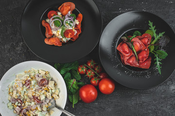 red, tomato-shaped heart-shaped ravioli, with the addition of an Italian salad