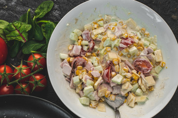 Italian, healthy salad with the addition of red tomato ravioli