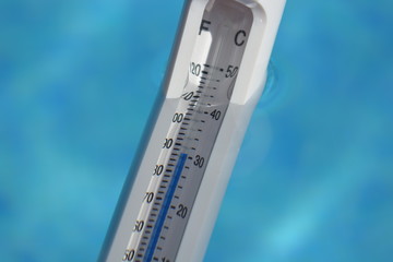 Water thermometer in swimming pool, temperature over 30