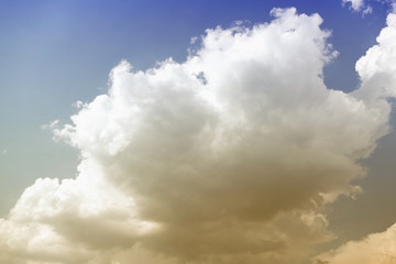 Blue sky with clouds on sunny day background