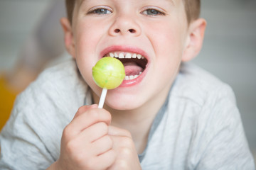 Teenager child with a tooth dropped out