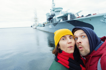 Funy selfie on the background of the old ship