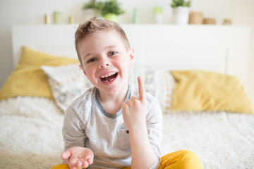 Teenager child with a tooth dropped out