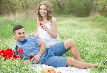 Fototapeta premium Young couple in the spring park