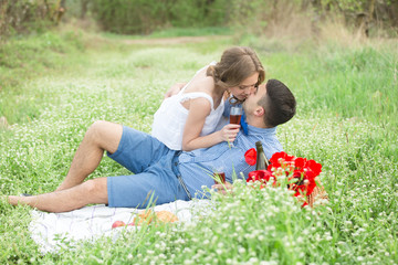 Fototapeta premium Young couple in the spring park