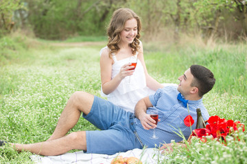 Young couple in the spring park