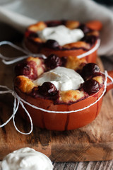 Cottage cheese casserole with cherry and sour cream