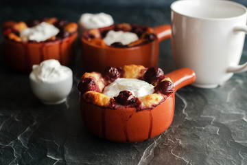 Cottage cheese casserole with cherry and sour cream