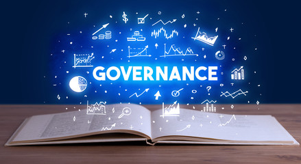 GOVERNANCE inscription coming out from an open book, business concept