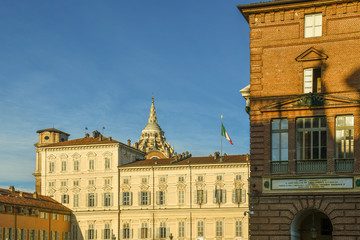 Exterior of Royal Armory and Royal Palace (Italian: Armeria Reale e Palazzo Reale) in Piazza Castello square in the historic centre of Turin in a sunny day, Piedmont, Italy