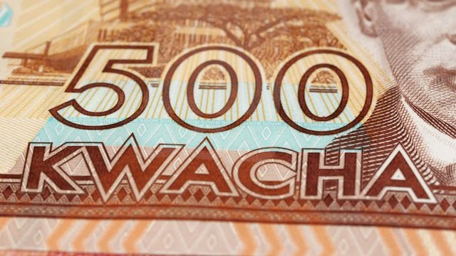 Malawian 500 kwacha (2014) banknote rotating. Currency of Malawi. Low angle, macro. 4K, 422 10 bit