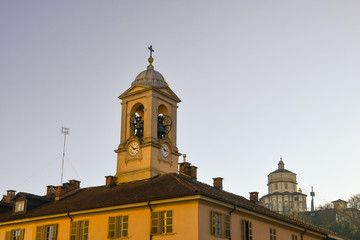 Obraz premium Bell tower of the Church of Gran Madre di Dio, located on the building adjacent to the church, and the Church of Santa Maria al Monte dei Cappuccini, Turin, Piedmont, Italy