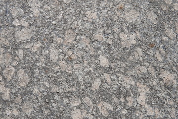 Natural stone red granite texture background. Bright hard red granite texture. Red granite texture stone background. Red granite texture untreated surface. Facing material horizontal background.