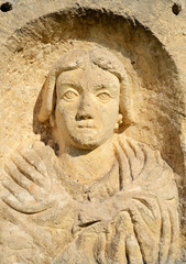 Naklejka na ściany i meble face of ancient statue