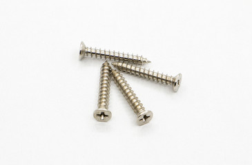 Medium size metal screws with the cross slot