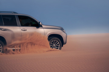 Off-road safari on the golden sands of the desert on a car in Walvis Bay. Namibia. SUV breaks...