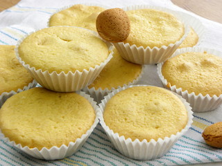 almond muffins on a towel close-up