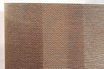 The texture of the fabric curtains hanging on the window. Background for fabric