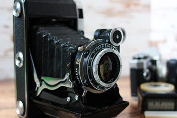 Fototapeta na wymiar Vintage film cameras and photo exposure meter
