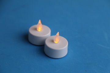 Obraz na płótnie Canvas white led and plastic candles