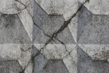 gray stone texture from dirty old concrete wall with wet cracks