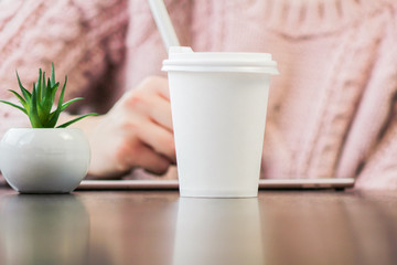 cup of coffee on table with cup of coffee