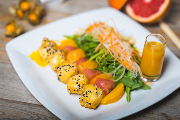 Original sweet rolls, Japanese-style dessert, rolls with sweet cheese and mango sauce.