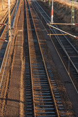 Fototapeta na wymiar Parallell railway tracks in low sunlight.