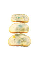 Fototapeta na wymiar three slices of bread covered with mold isolated on a white background vertical format