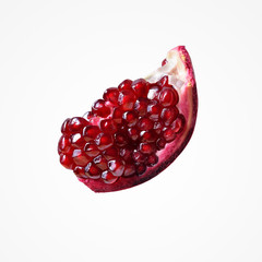 Juice vibrant red piece pomergranate isolat on white background.