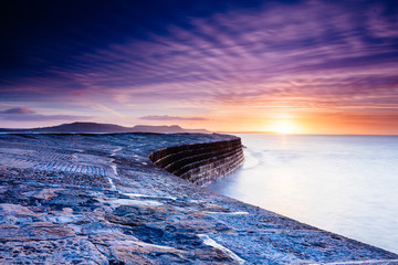 Naklejka premium The Cobb Lyme Regis at Sunrise