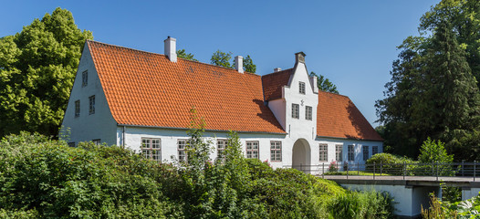 Panorama of the Schackenborg castle in historic town Mogeltonder, Denmark