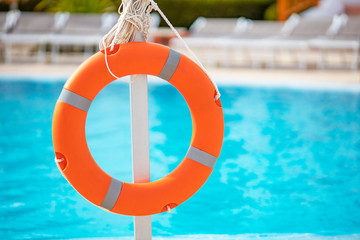 life buoy close-up on pool background with blurry background