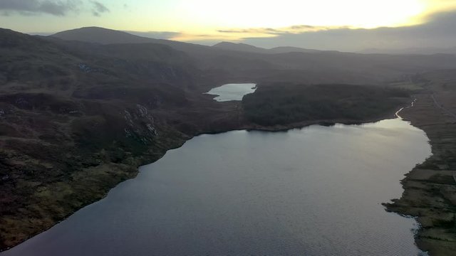 Flying above Lough EA towards Lough Maddy between Ballybofey and Glenties in Donegal - Ireland