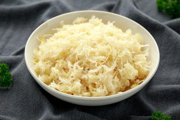 Fresh pickled cabbage in white bowl. healthy winter food