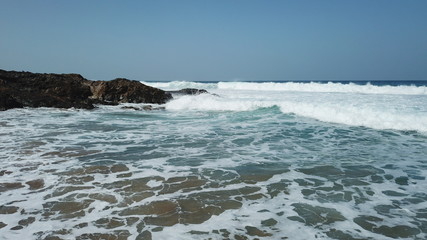 Dawn watching the waves of the sea in the Atlantic Ocean