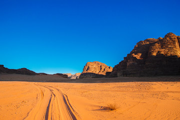 Fototapeta na wymiar Sand mountain The Seven Pillars of Wisdom against the blue sky, Jordan, Wadi RAM desert.