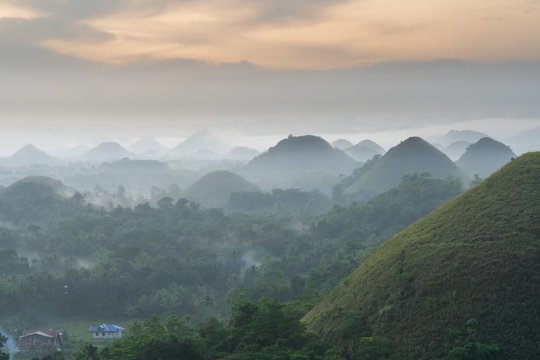time papse Panorama view of chocolate hills in Bohol, philippines at sunrise, mist fog, carmen, Asia