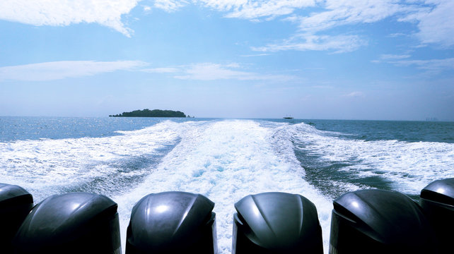 "Jakarta, Indonesia - November 17, 2019: Speed boat engine with full speed drive on" Pulau Seribu ".