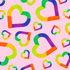 Colorful hearts pattern on pink background. Valentine's Day background.