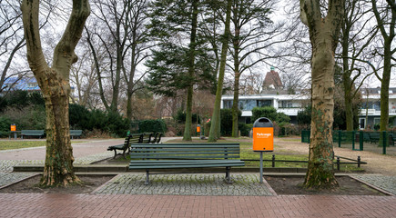 orange trash for cleanliness in the park