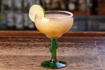 cocktail garnished with lime